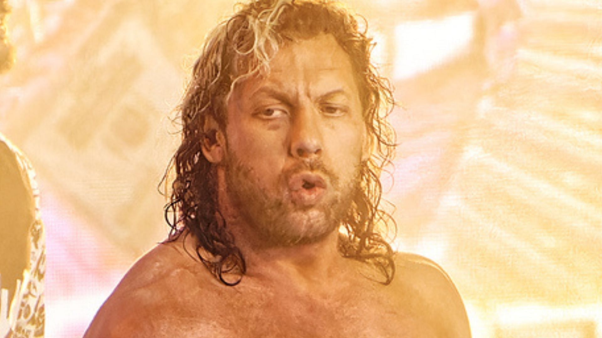 Which top star was humiliated by Kenny Omega?