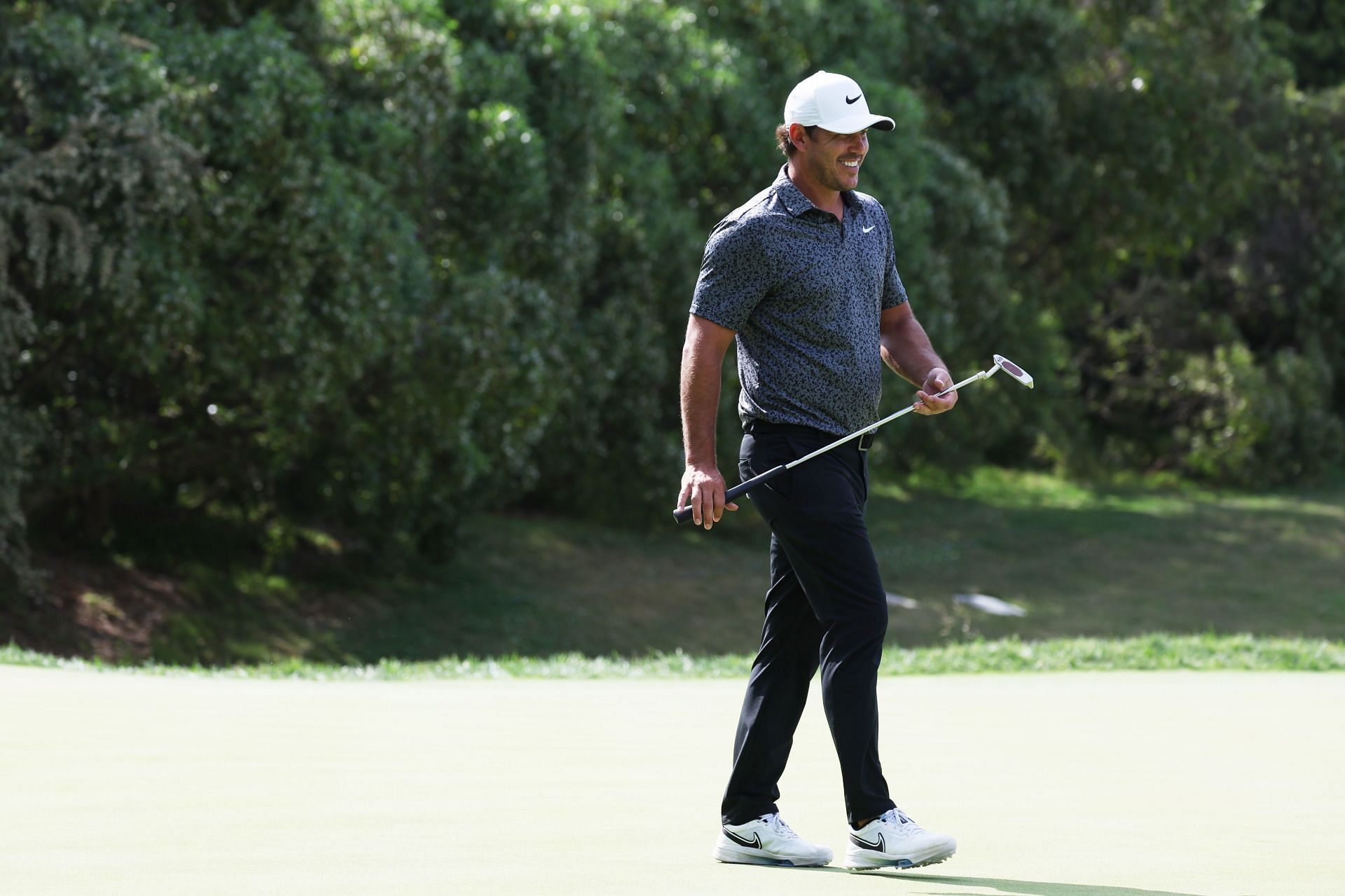 Koepka even had time to joke about his &quot;presence&quot; at the Travelers Championship next week (Image via Getty).