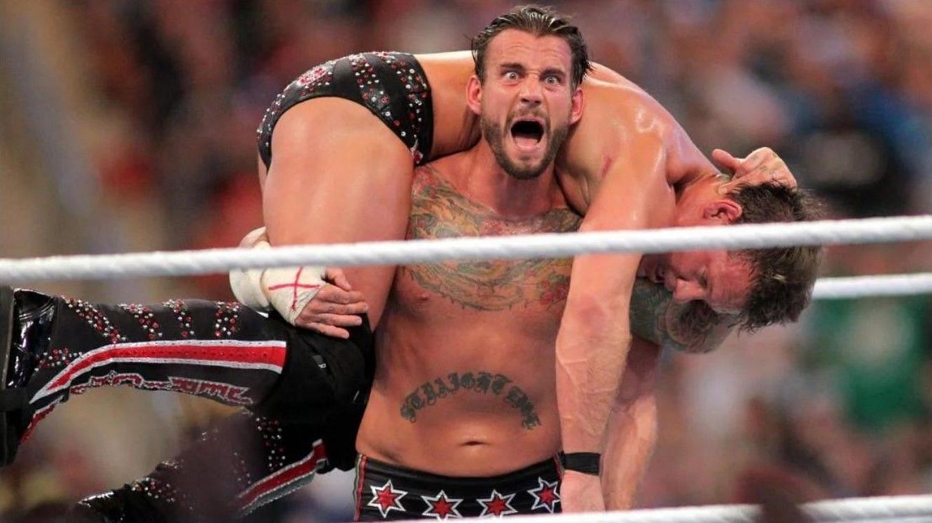 CM Punk lifting Chris Jericho for GTS at WrestleMania 28