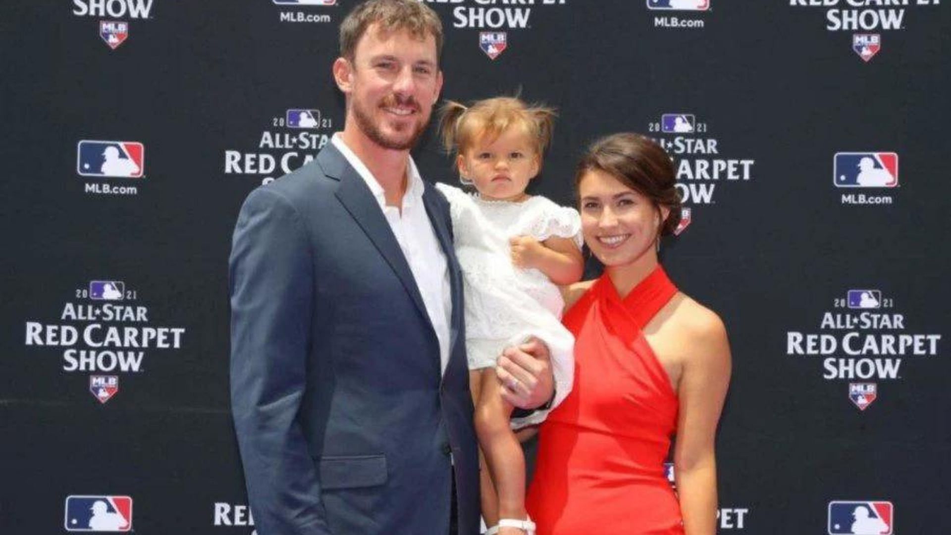 Chris bassitt and his wife Jessica with their daughter