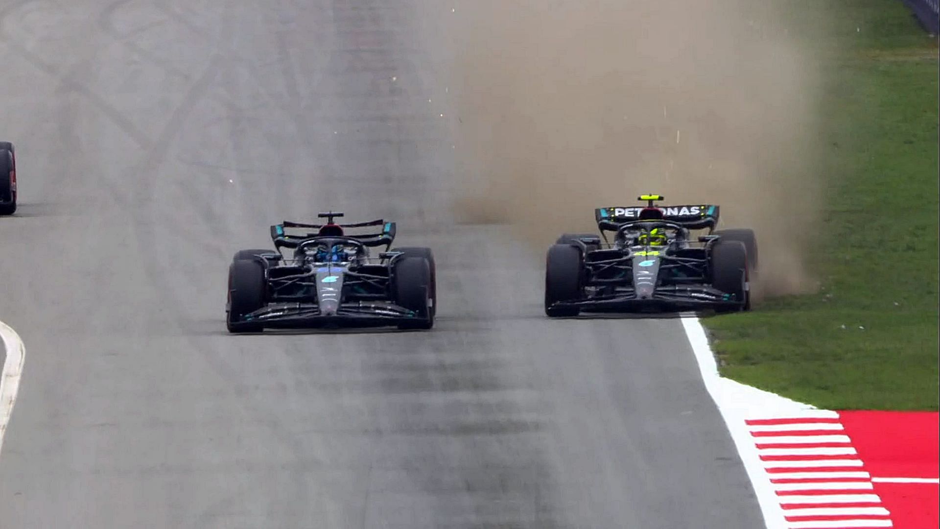 George Russell (63) and Lewis Hamilton (44) collide with each other during the qualifying session prior to the 2023 F1 Spanish GP (Image via Sportskeeda)