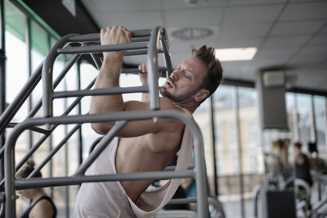 Gradually building strength is the crucial factor in improving your pull-up performance. (Andrea Piacquadio/ Pexels)