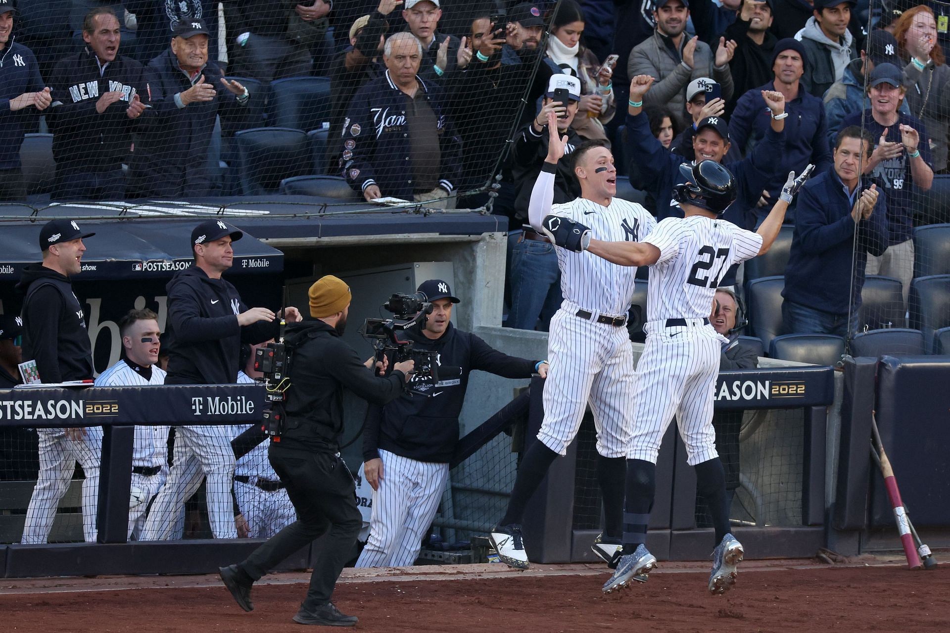 Giancarlo Stanton celebrates with Aaron Judge after his three-run home run at Yankee Stadium