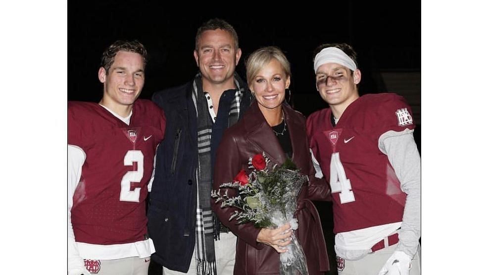 Kirk Herbstreit and his wife Alison with their sons, Tye and Jake