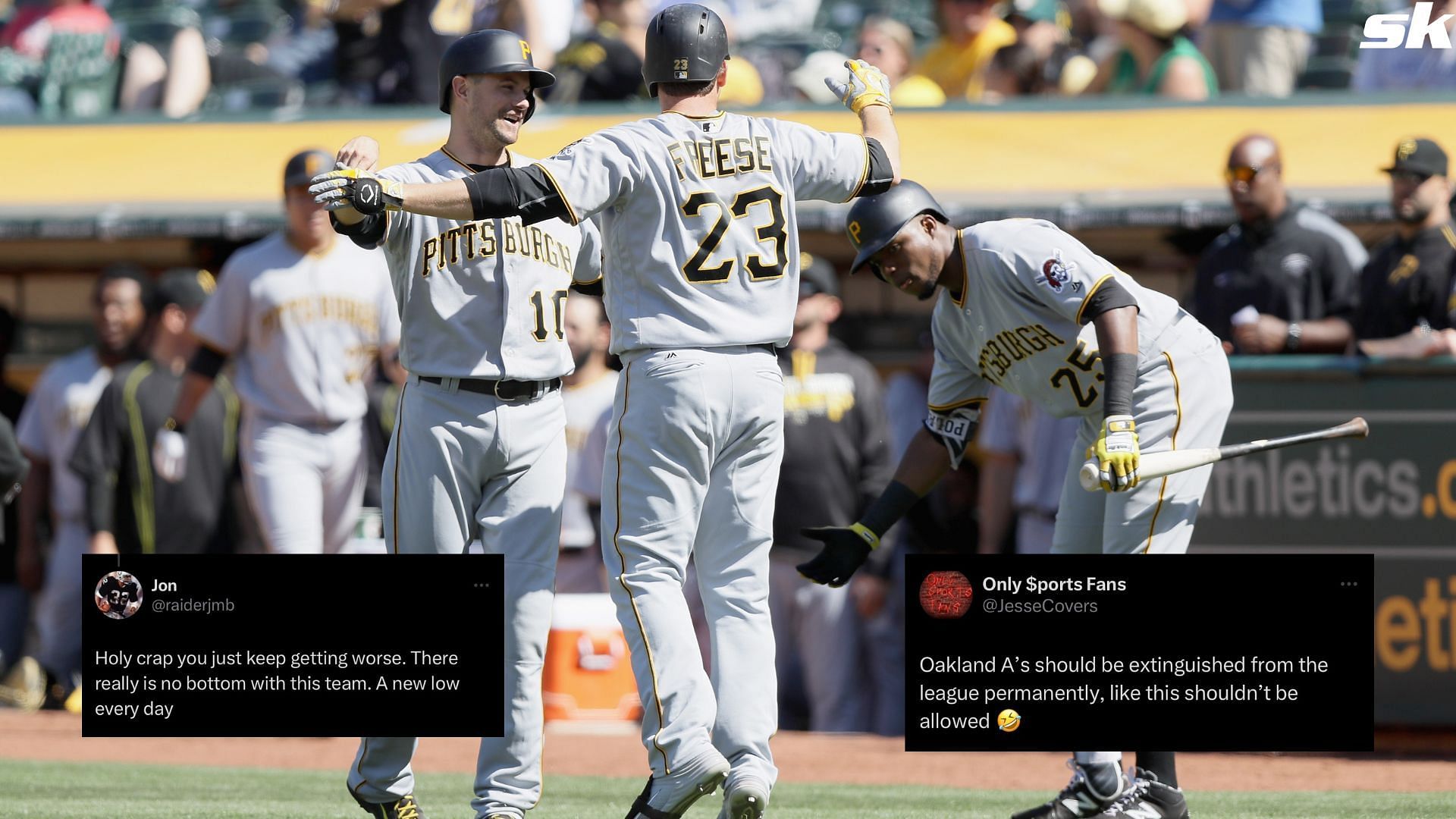 Pittsburgh Pirates players celebrate after scoring against the Oakland A