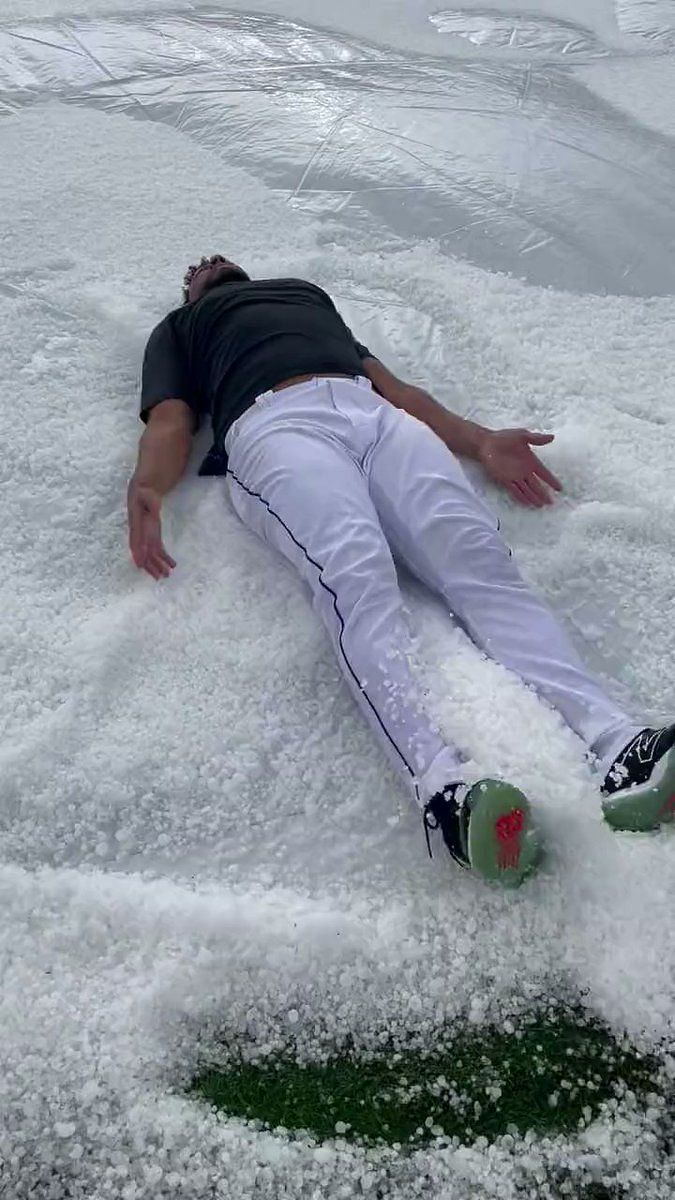 Coors Field dugout buried in 2 feet of hail 
