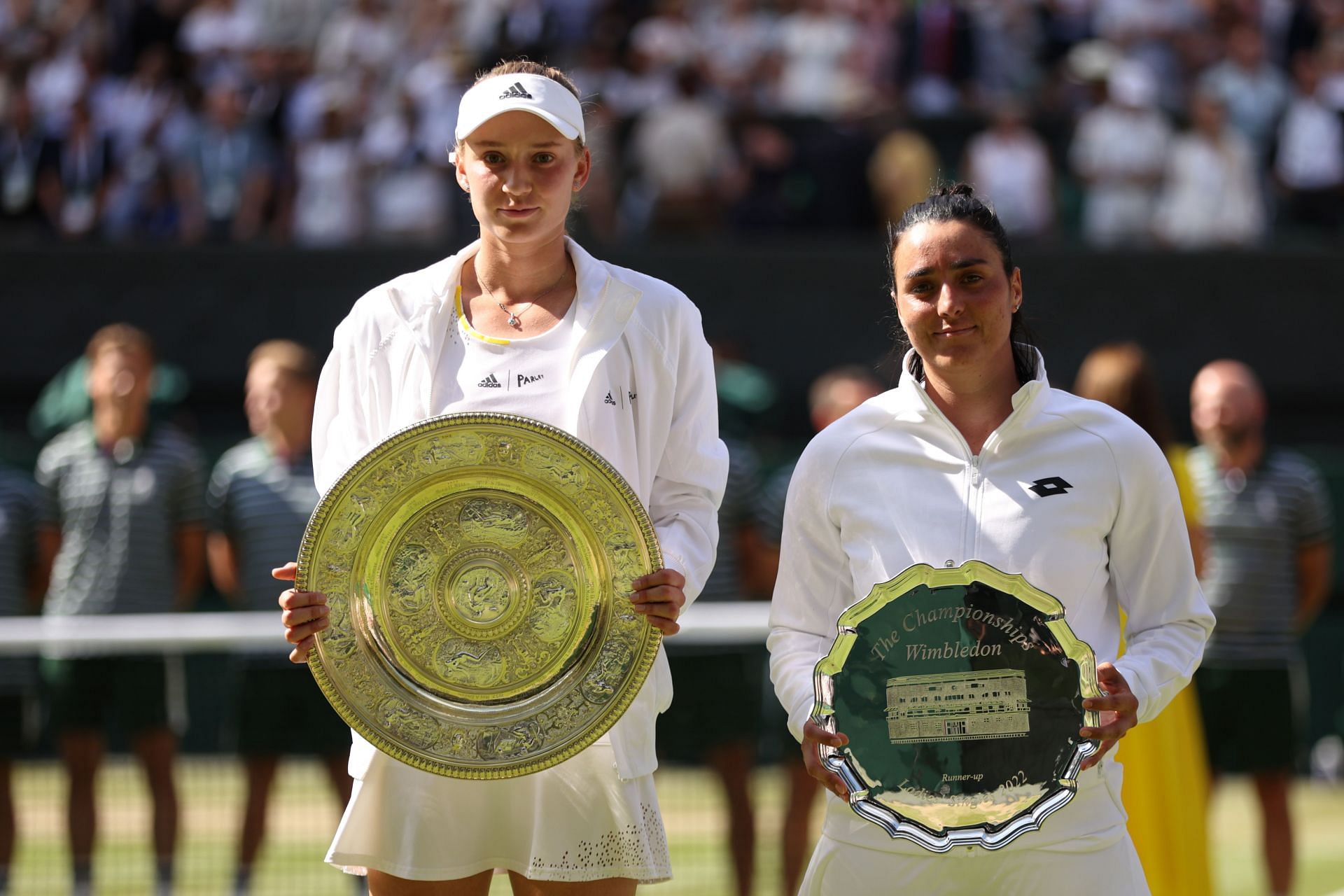 Elena Rybakina (L) &amp; Ons Jabeur with their 2022 Wimbledon trophies.