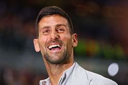 'Iron Man' Novak Djokovic maintains air of secrecy about mysterious object spotted on his chest at French Open