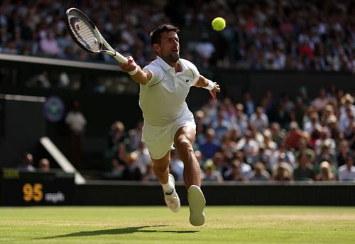 Novak Djokovic in action against Jannik Sinner at Wimbledon