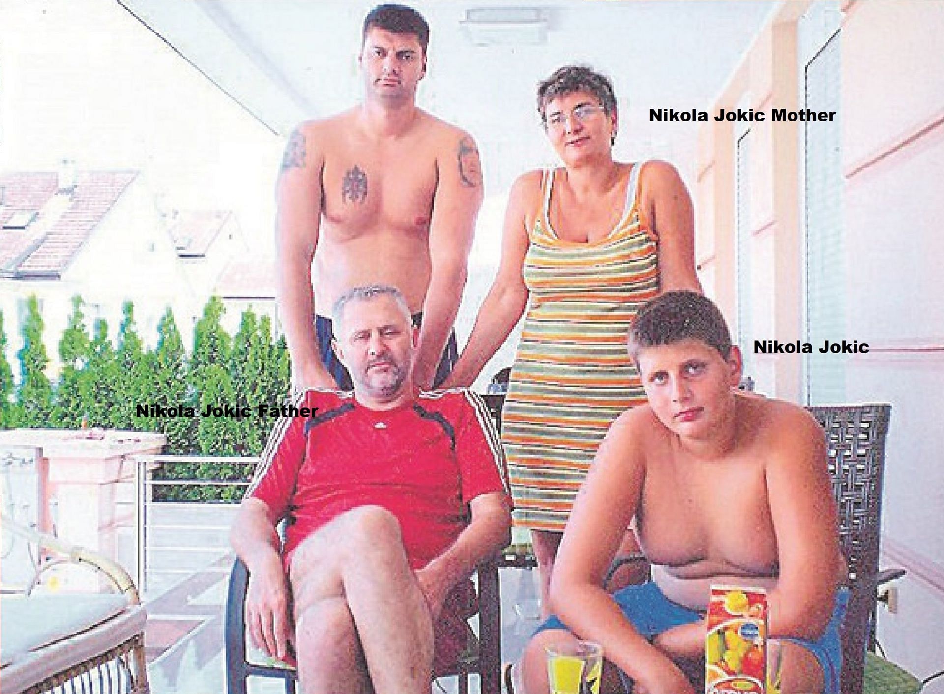 Young Jokic with his parents