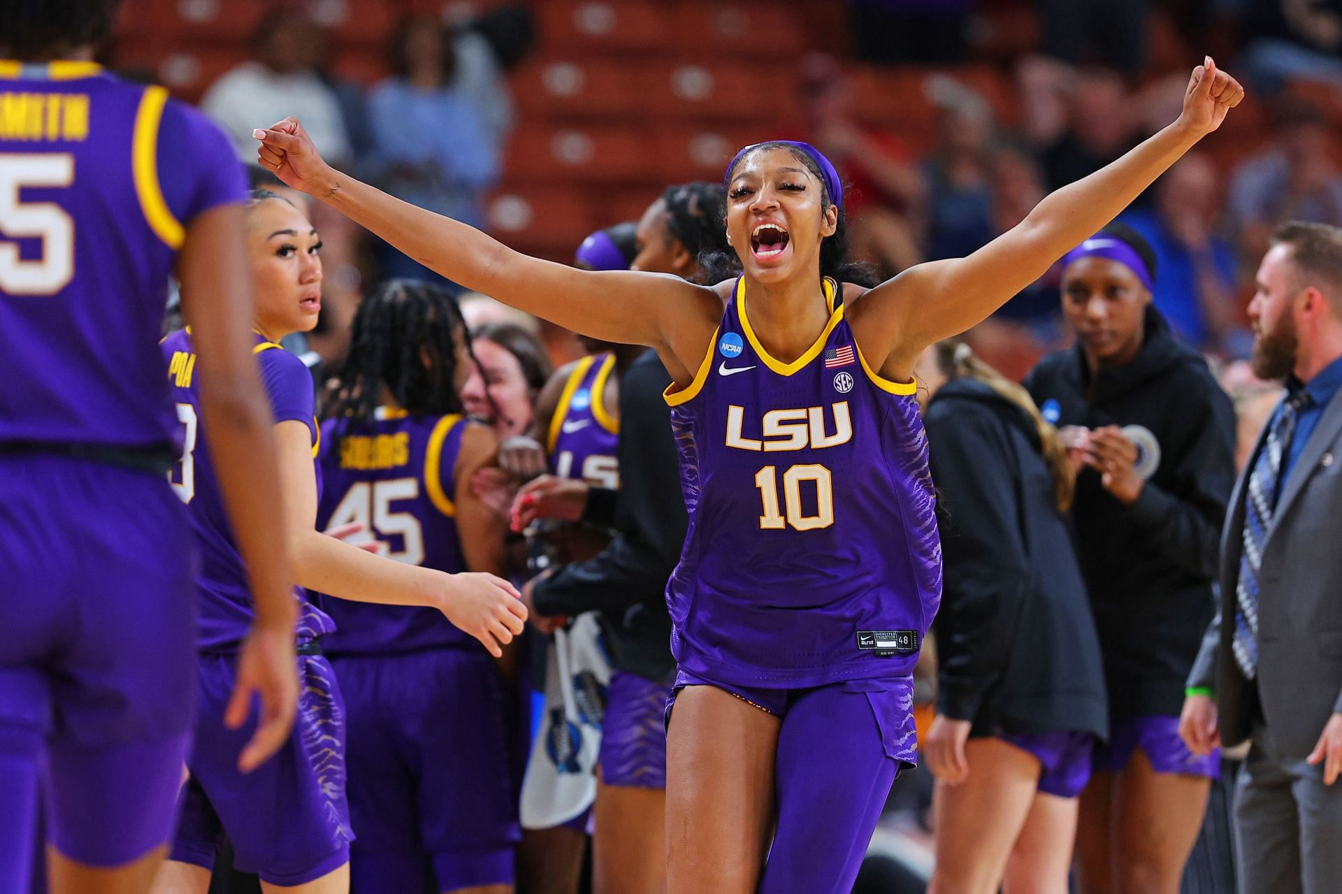 Angel Reese of the LSU Tigers celebrates after LSU beat the Utah Utes.