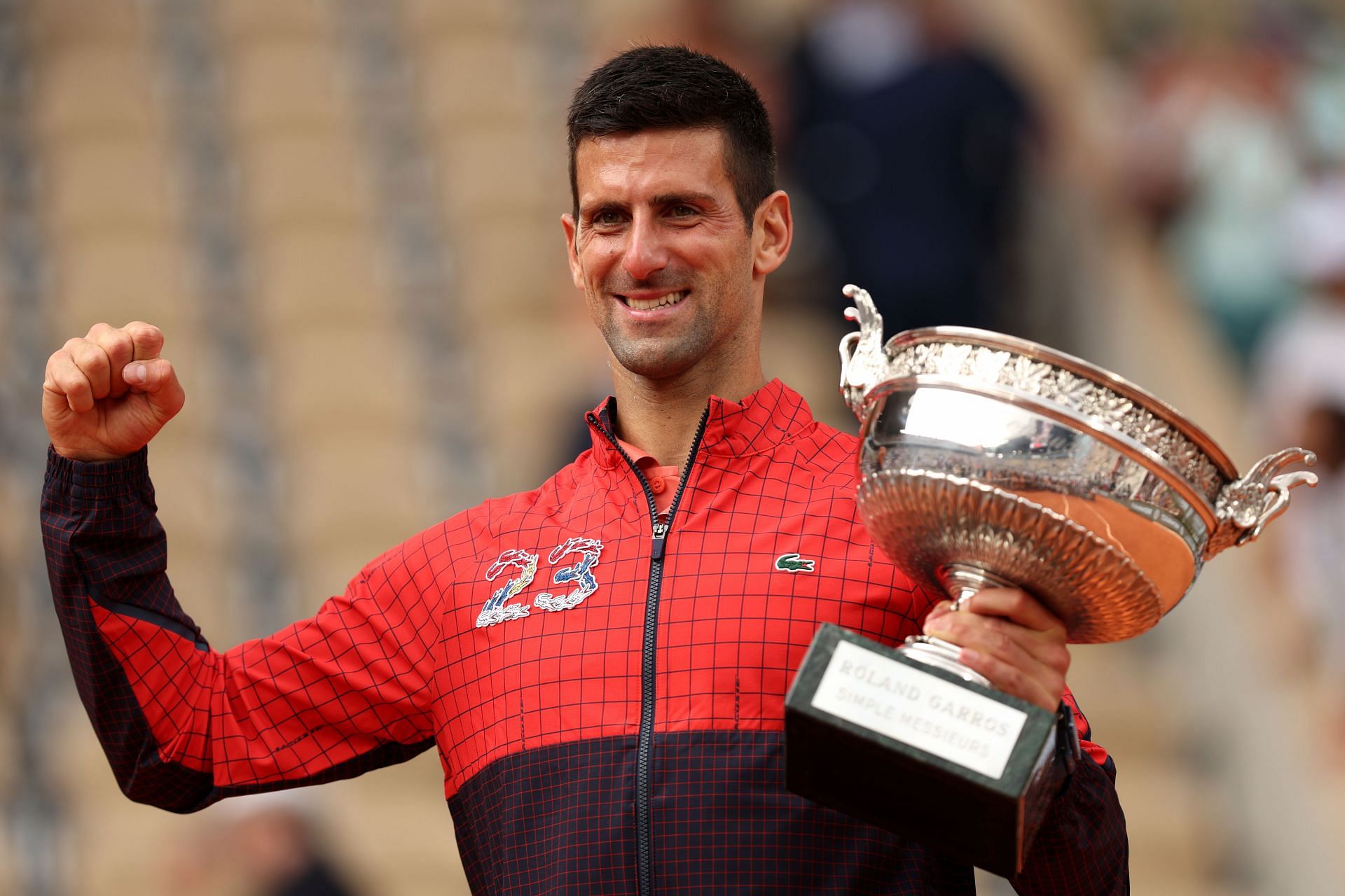 Novak Djokovic with the 2023 French Open trophy