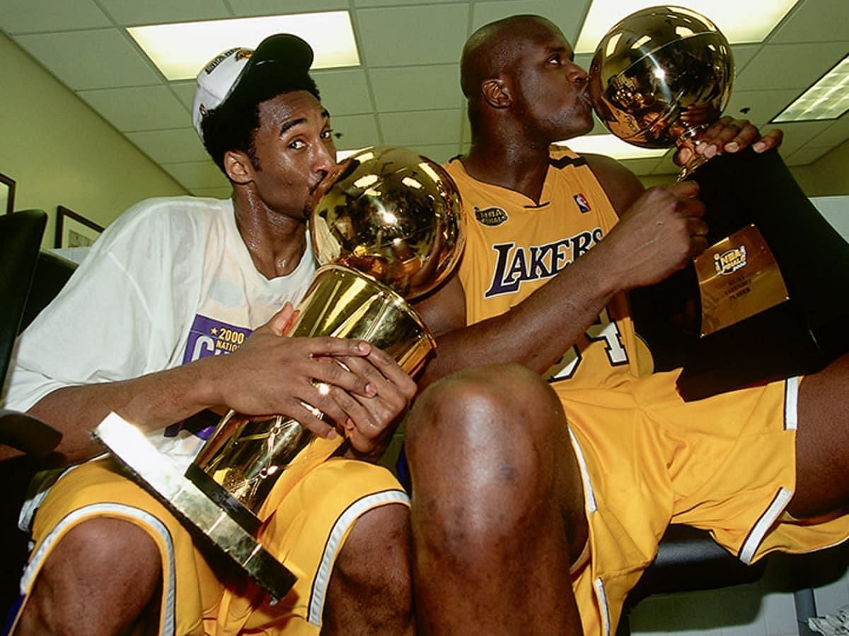 Kobe and Shaq posing with Finals trophy