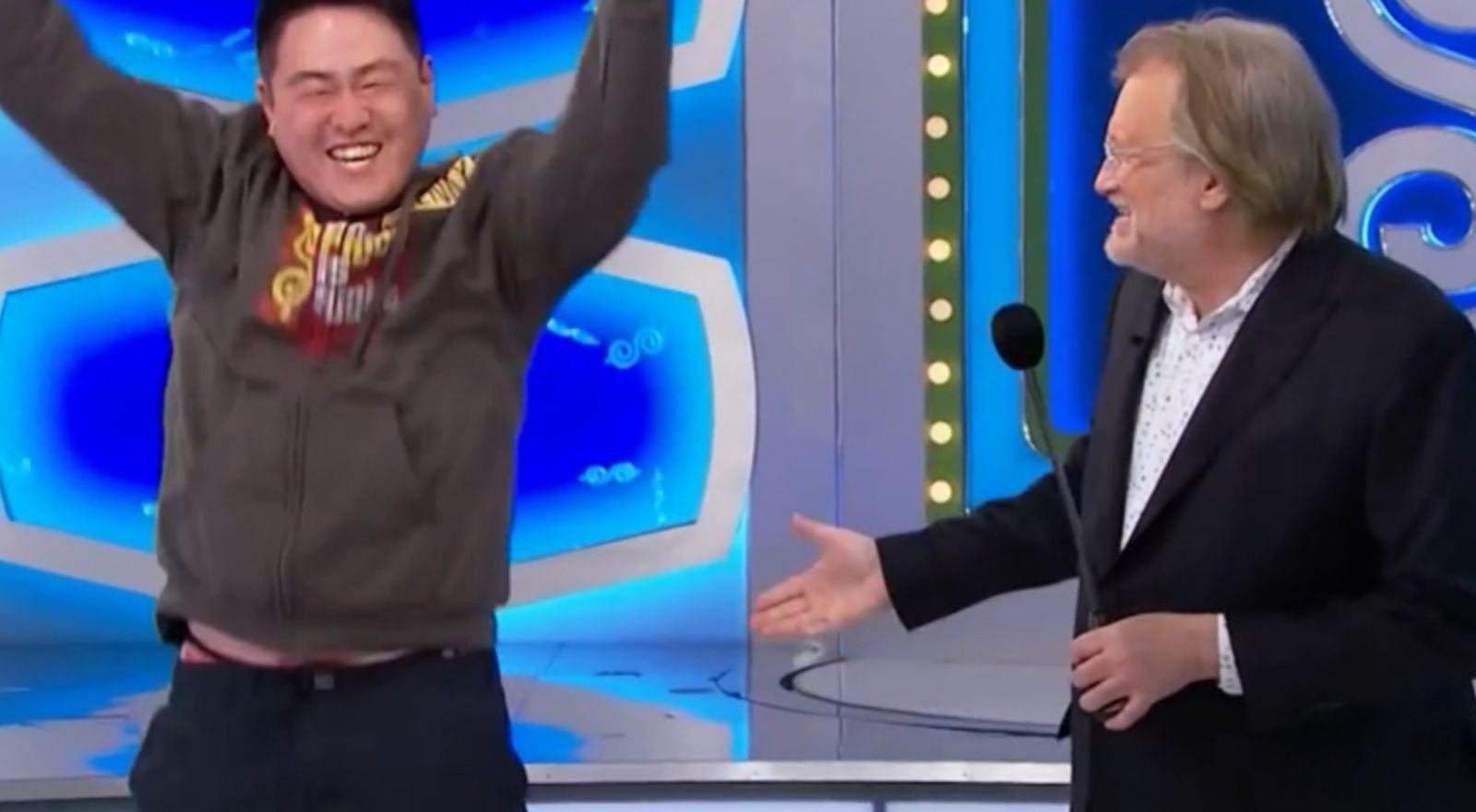 The Price Is Right contestant Henry and the show host Drew (image via The Price Is Right)