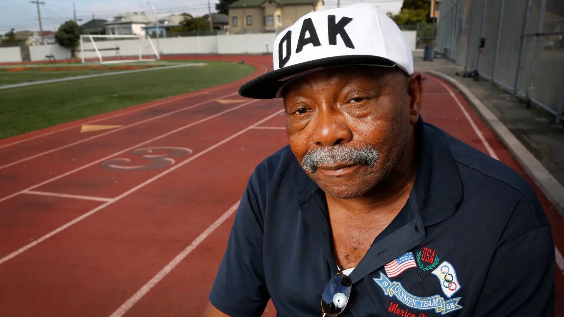 In 2016, Jim Hines posed at his alma mater, McClymonds High School in Oakland, California. (Image credit: MediaNewsGroup via Getty Images)