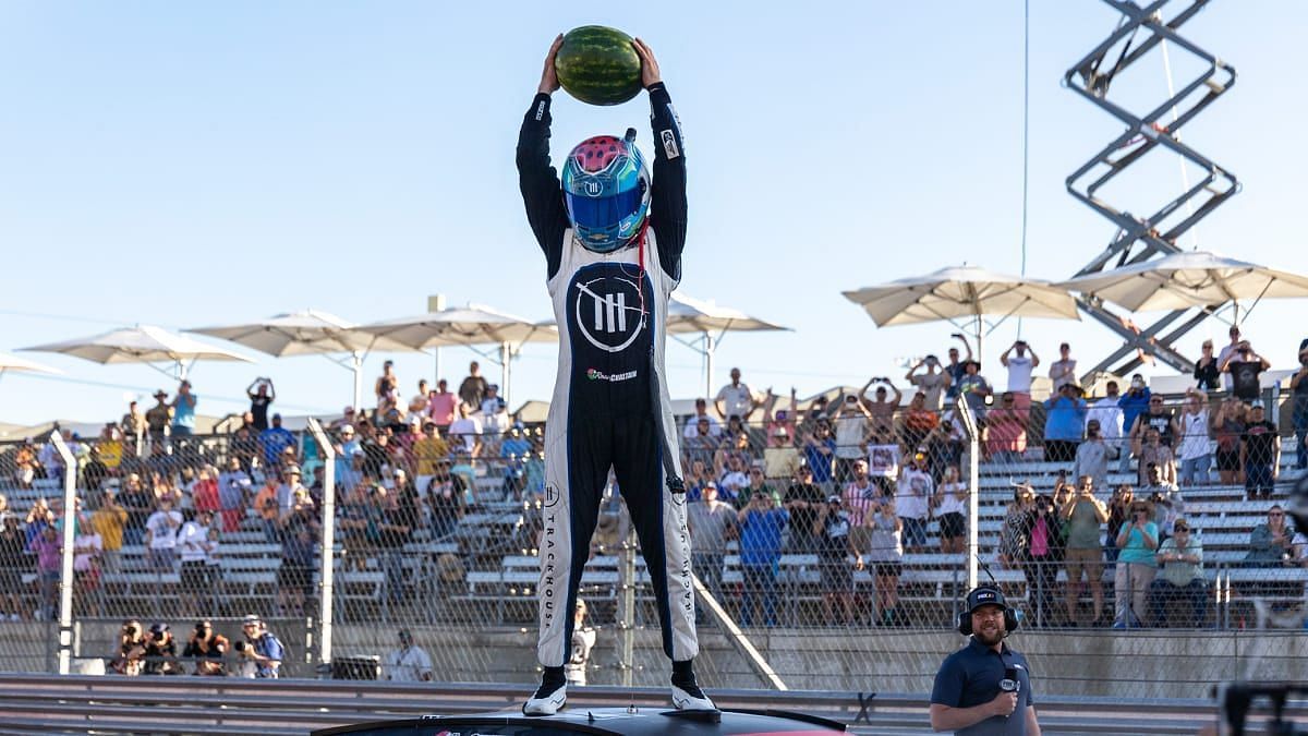 Ross Chastain preparing to smash a watermelon from on top of his car. Picture Credits: Sports Illustrated
