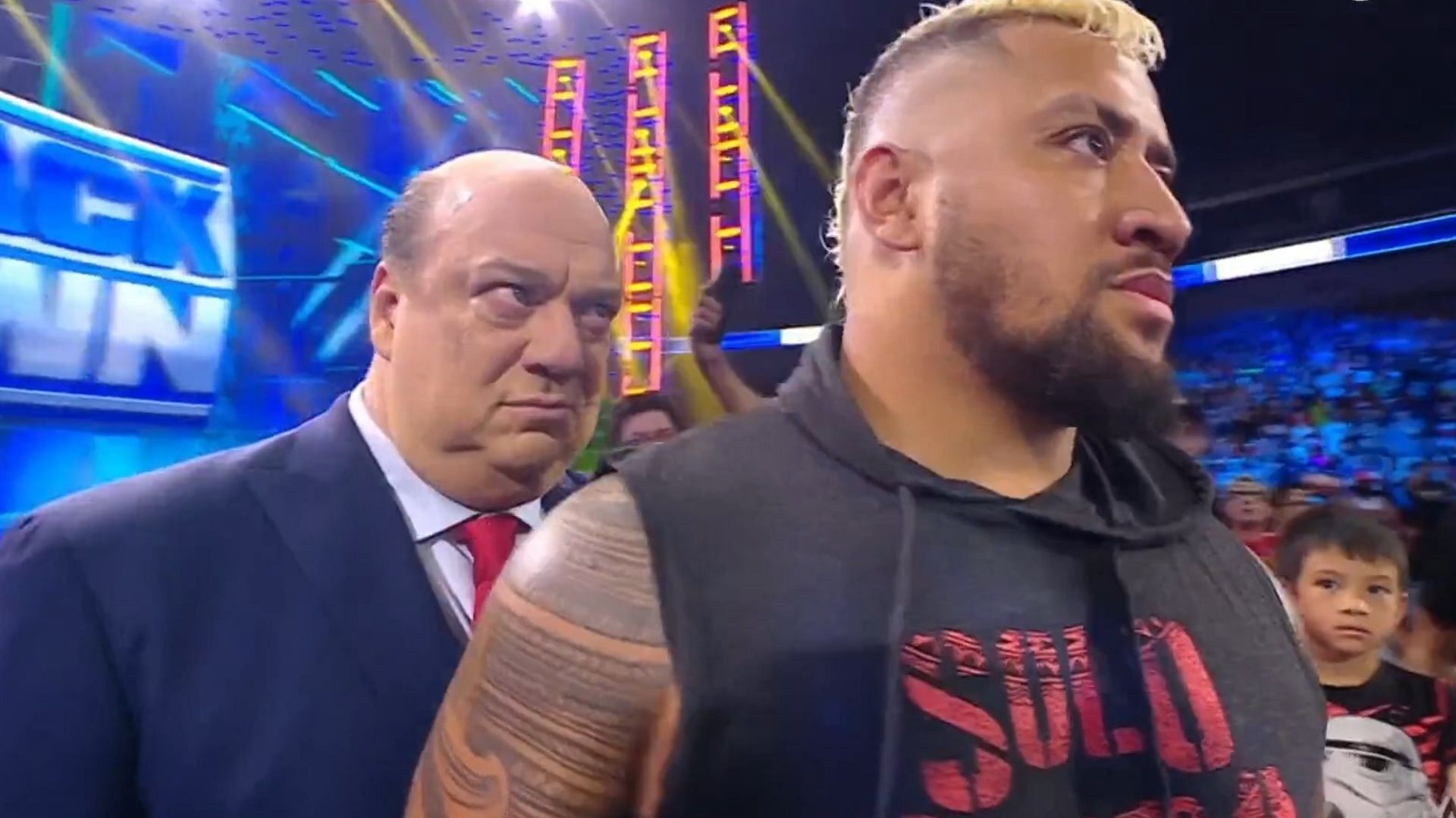 Paul Heyman closely watches Solo Sikoa on WWE SmackDown.
