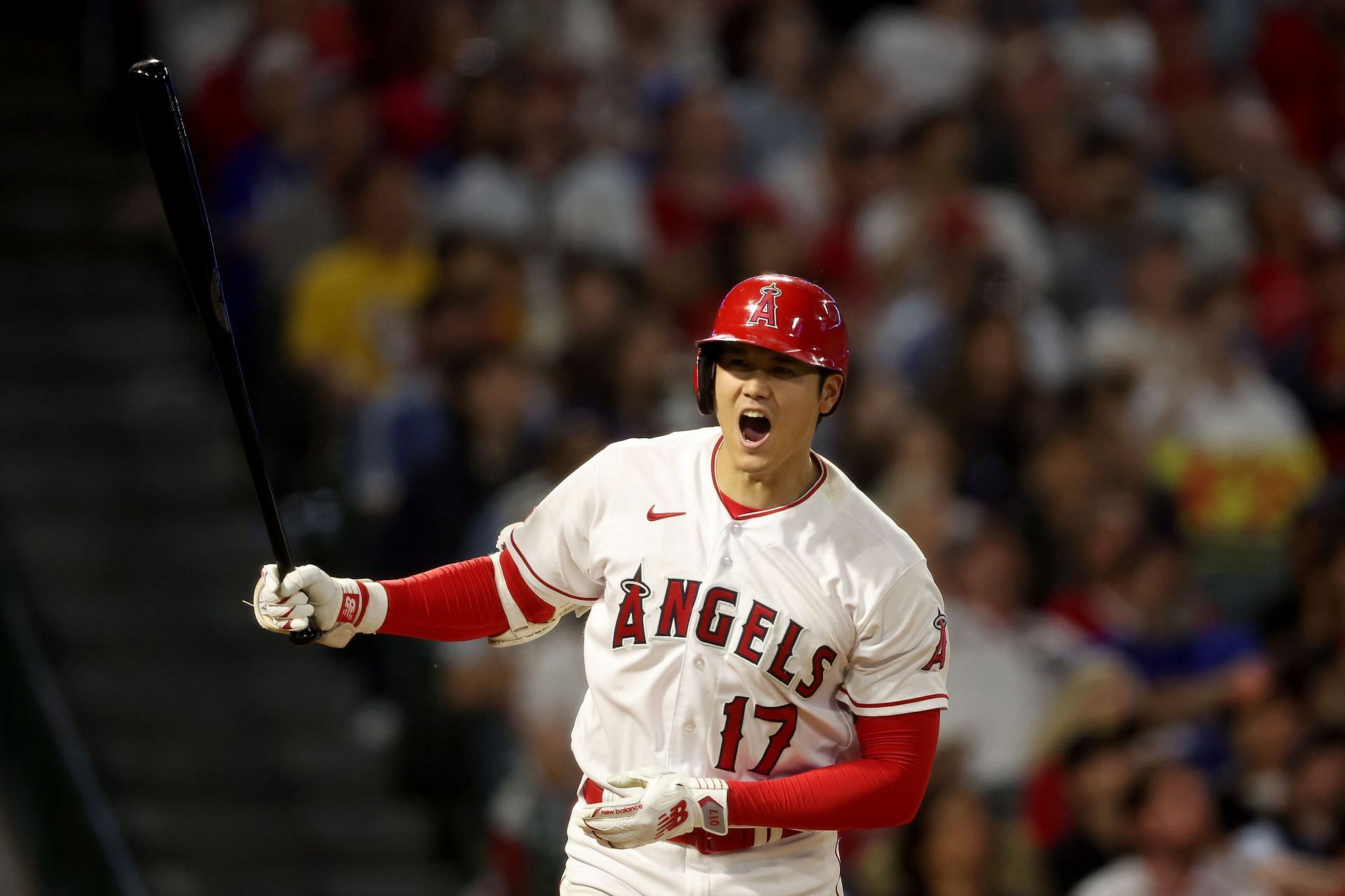 Shohei Ohtani of the Los Angeles Angels reacts after flying out against the Los Angeles Dodgers at Angel Stadium of Anaheim