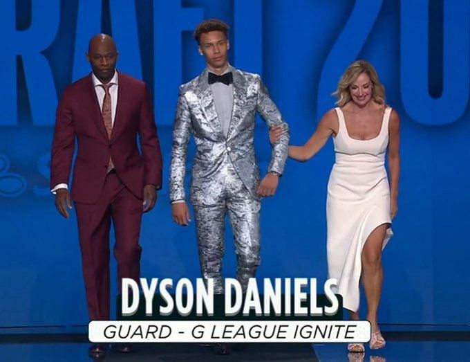 Kool Daniels Goes Viral in Side-Slit White Dress & Heels at NBA Draft –  Footwear News