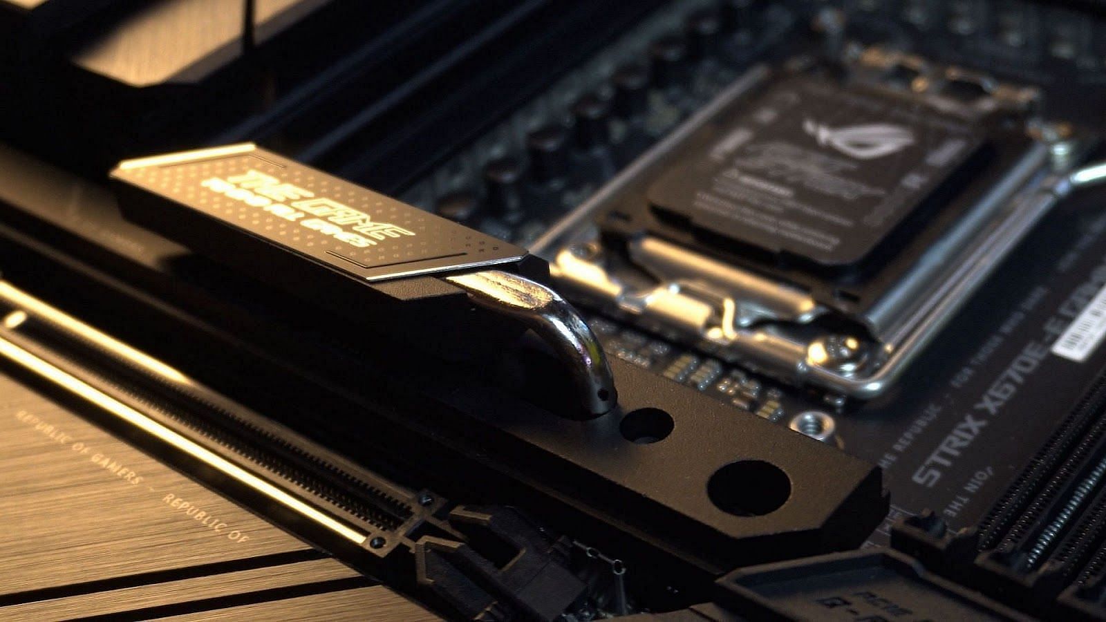 The PCIe Gen 5 SSD heatsink on the ASUS motherboard (Image via Sportskeeda)