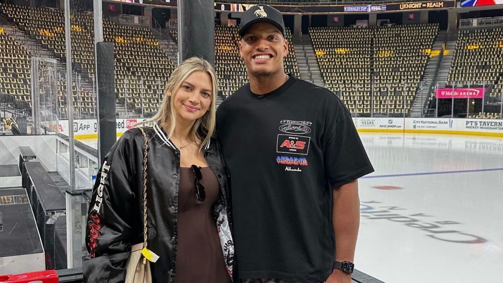 TikTok personality Allison Kuch with her husband, NFL defensive end Isaac Rochell, take a photo inside the T-Mobile Arena before a Vegas Golden Knights game. (Image credit: Allison Kuch on Instagram)