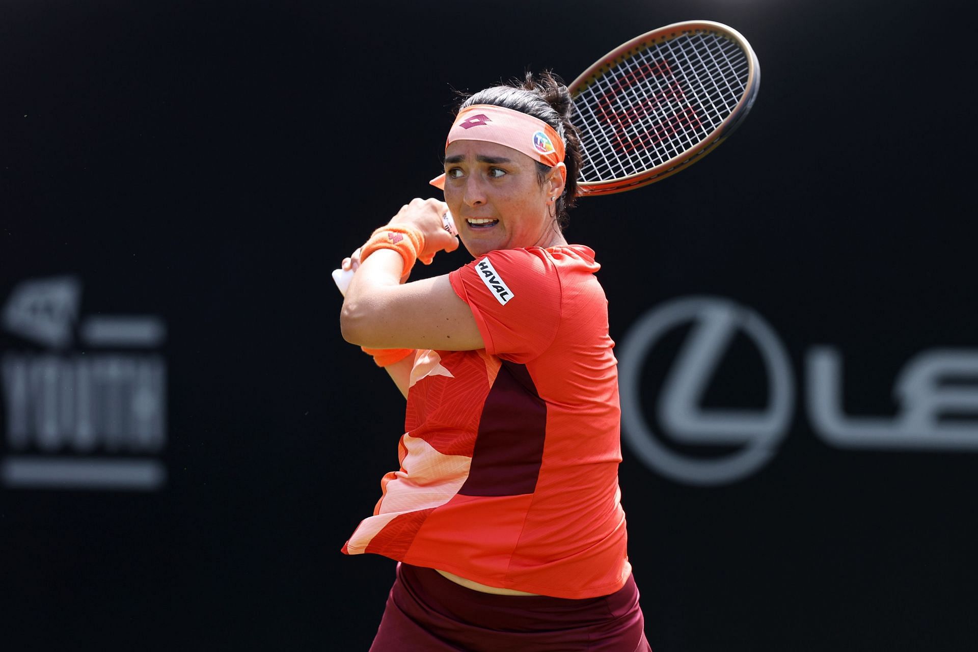 Jabeur strikes the ball at the Rothesay International Eastbourne