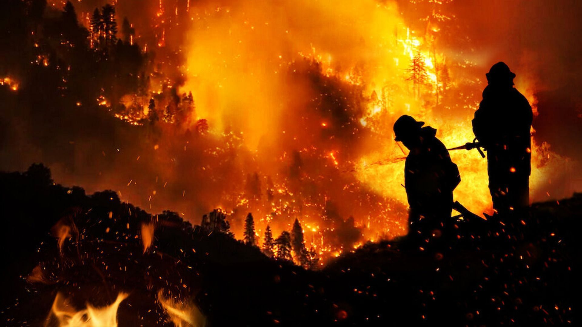 Firefighters struggling to put out wildfires. (Image via Netflix)