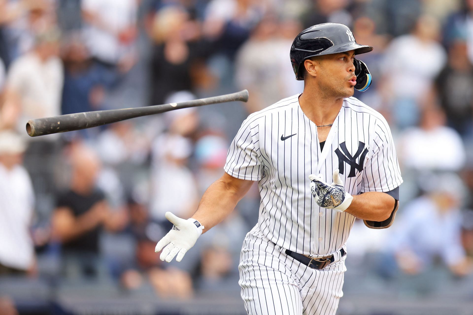 Giancarlo Stanton of the New York Yankees hits a two-run double in the seventh inning against the Minnesota Twins at Yankee Stadium on April 15.