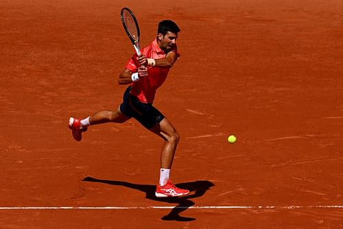 Novak Djokovic in action at the 2023 French Open.