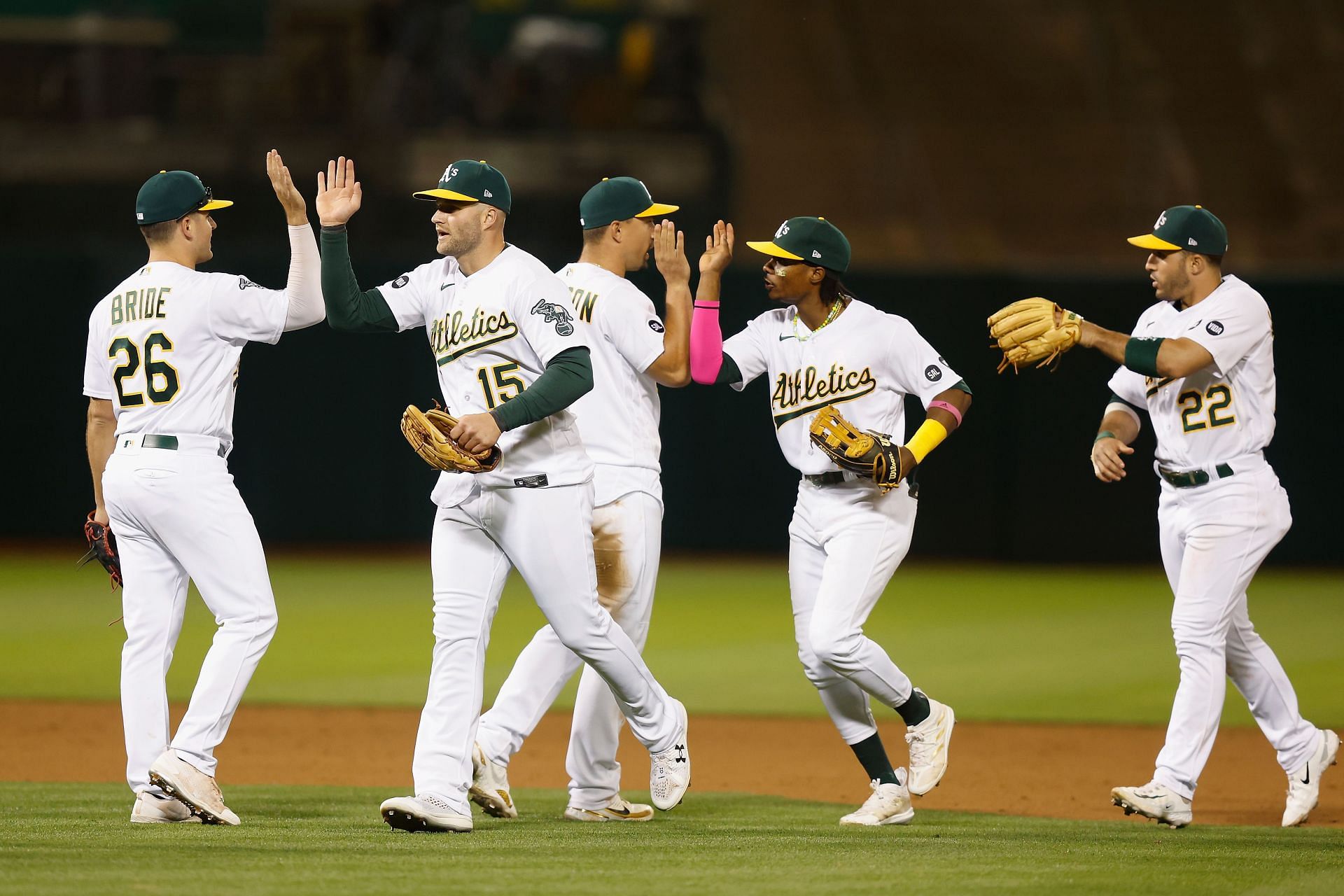 Oakland Athletics players celebrate after a 4-3 win against the Tampa Bay Rays at RingCentral Coliseum on June 12, 2023