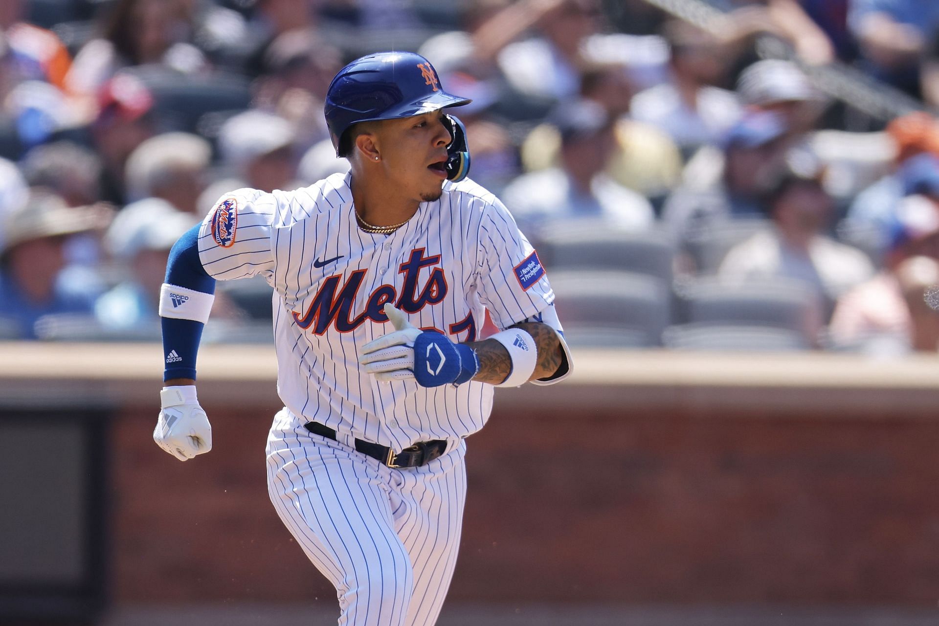 Mark Vientos #27 of the New York Mets his a RBI sacrifice fly in the sixth inning against the Philadelphia Phillies at Citi Field on June 01, 2023