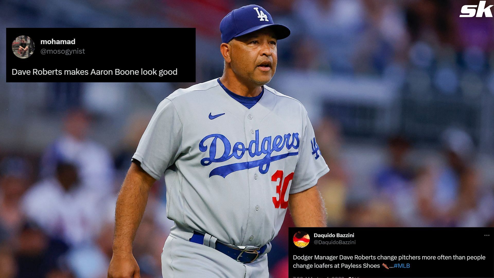 Manager, Dave Roberts of the Los Angeles Dodgers comes out to make a pitching change during the fifth inning against the Atlanta Braves at Truist Park on June 25, 2022 in Atlanta, Georgia.