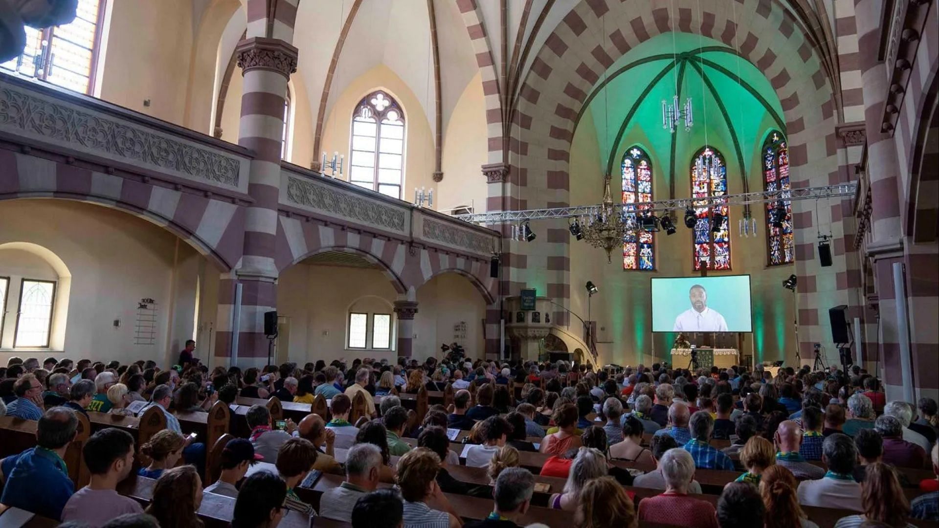Netizens respond to AI delivering sermon at a church in Germany. (Image via Matthias Schrader)