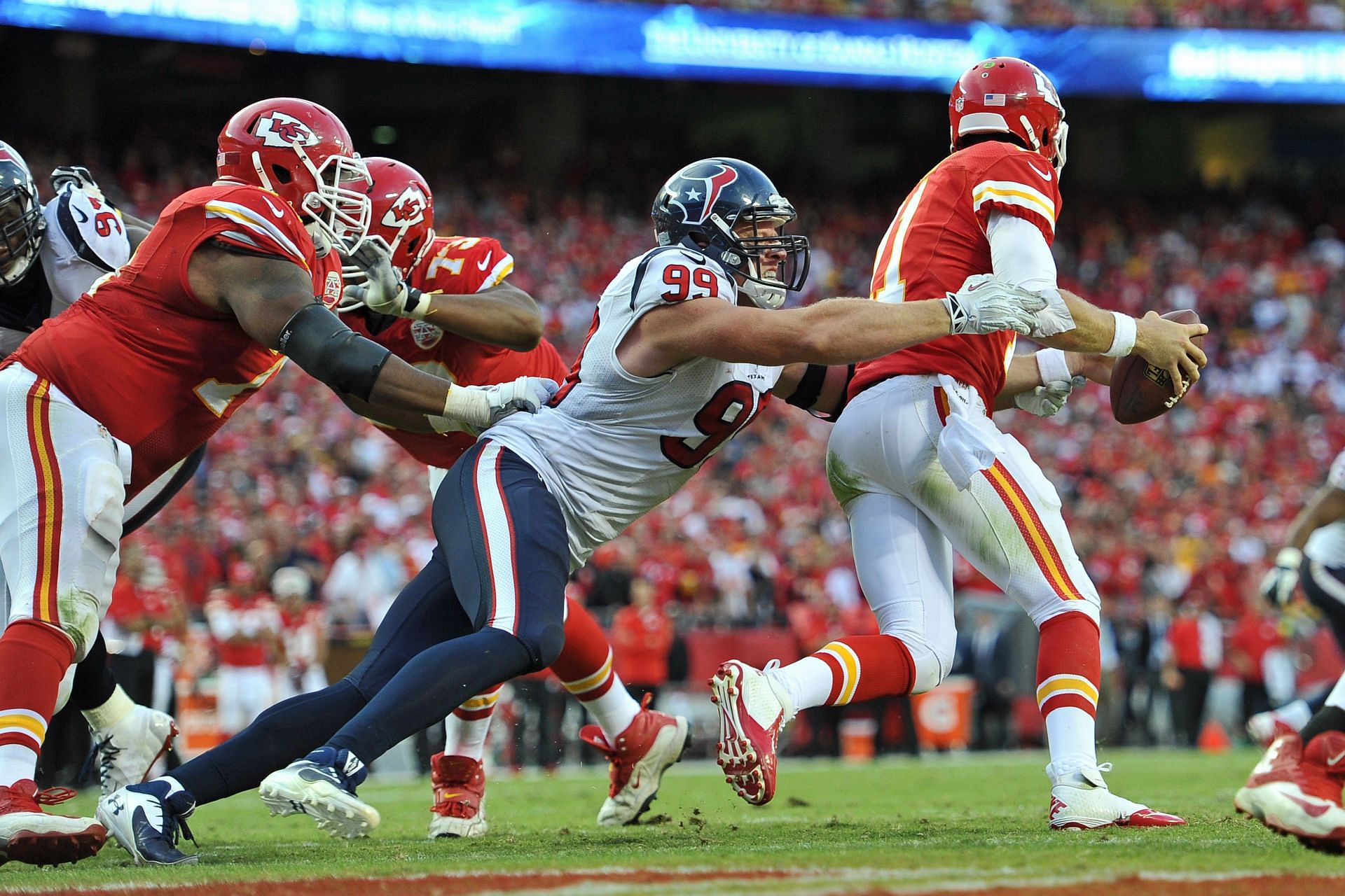 Houston Texans DE J.J. Watt sacking Kansas City Chiefs QB Alex Smith