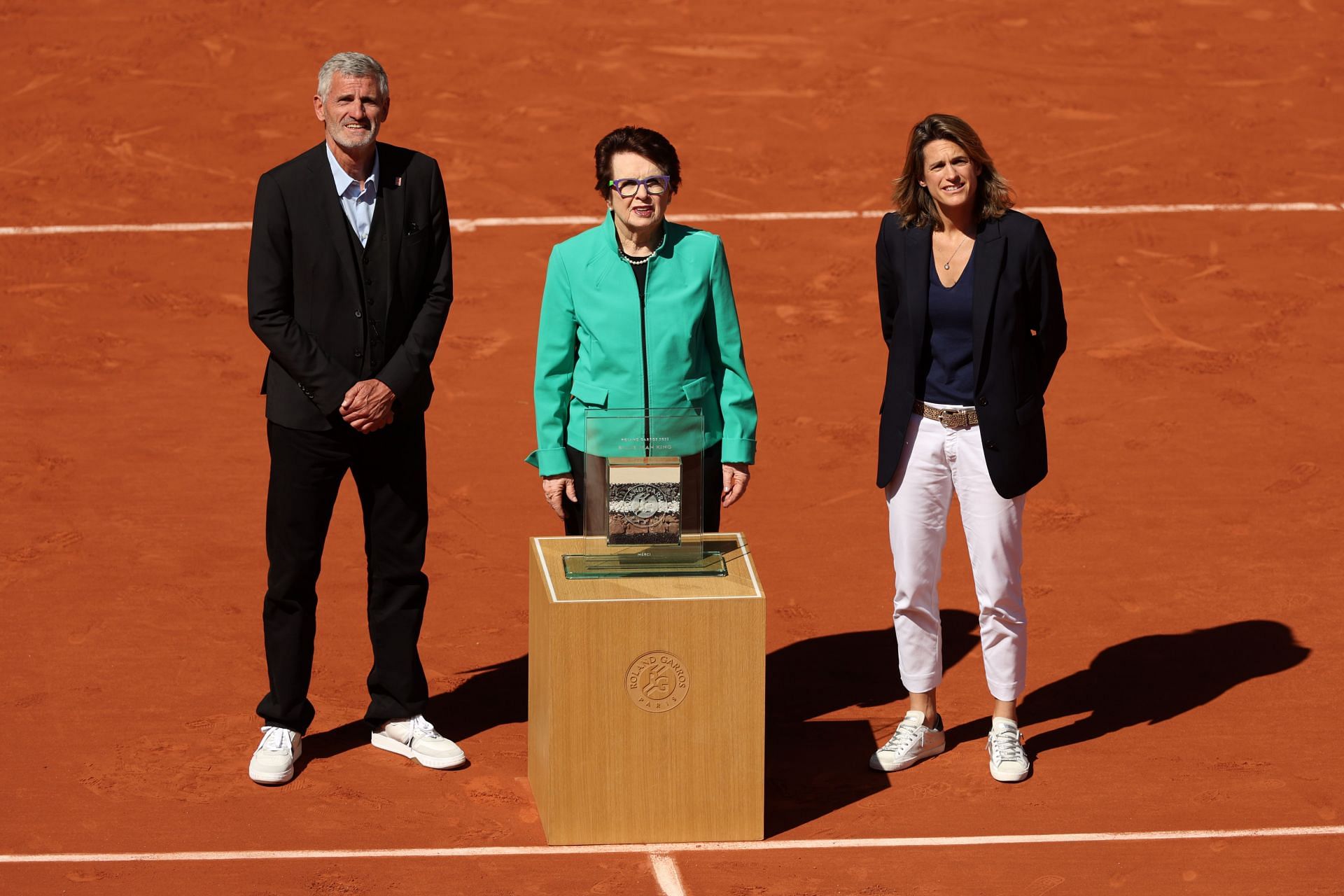 Amelie Mauresmo alongside Billie Jean King and Gilles Moretton at French Open 2022
