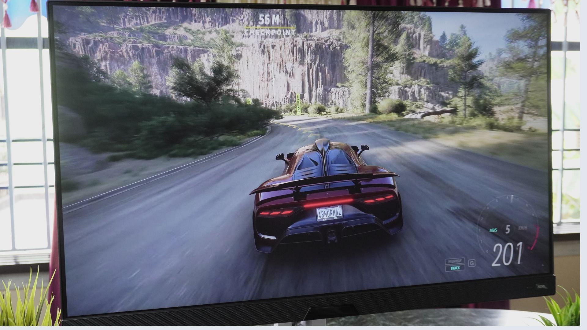 The picture quality of the BenQ Mobiuz EX2710U monitor (Image via Sportskeeda)