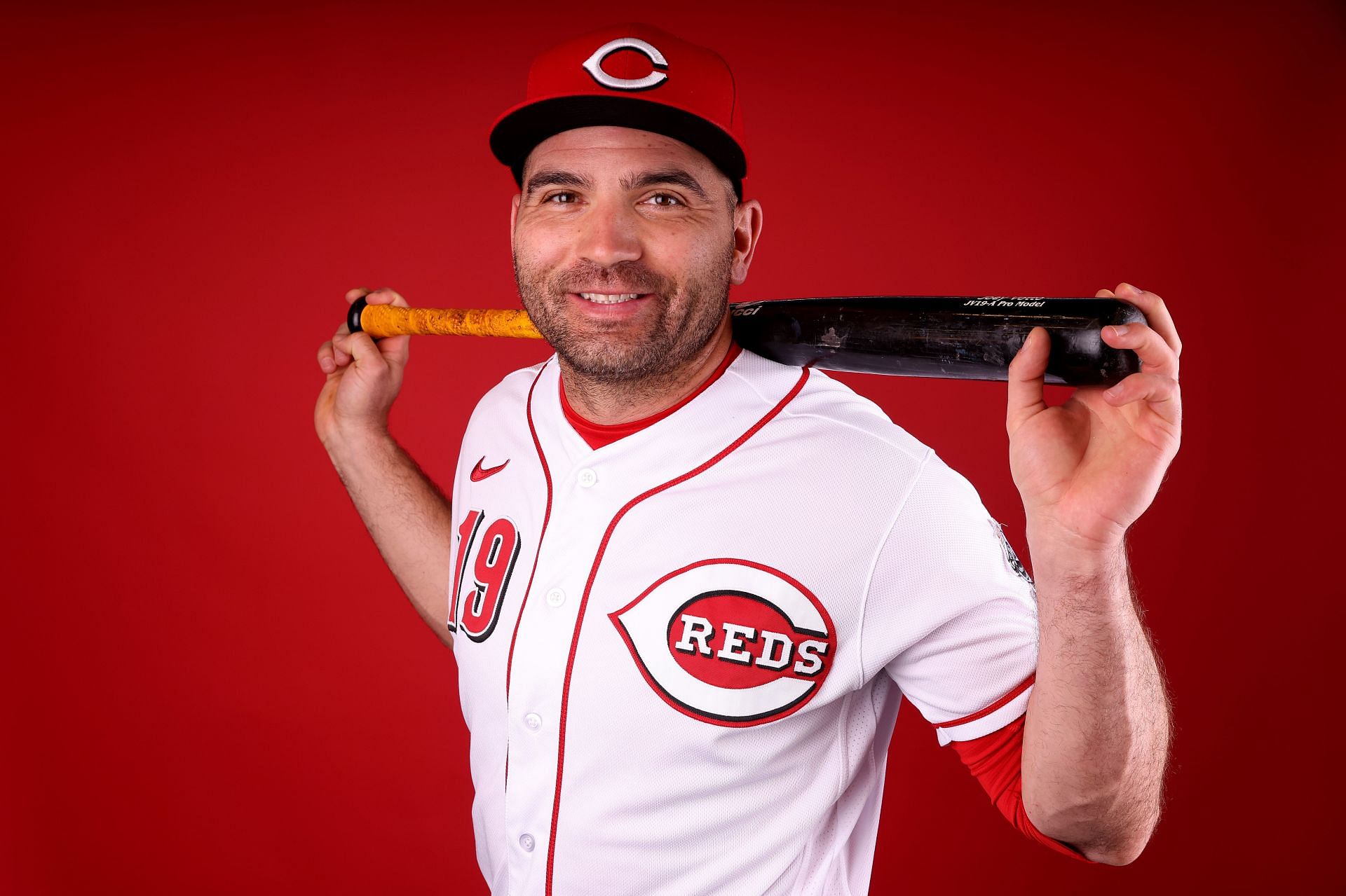 Joey Votto #19 of the Cincinnati Reds poses for a portrait during photo day