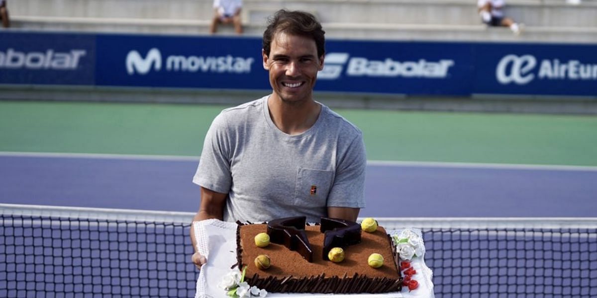 Rafael Nadal with his birthday cake