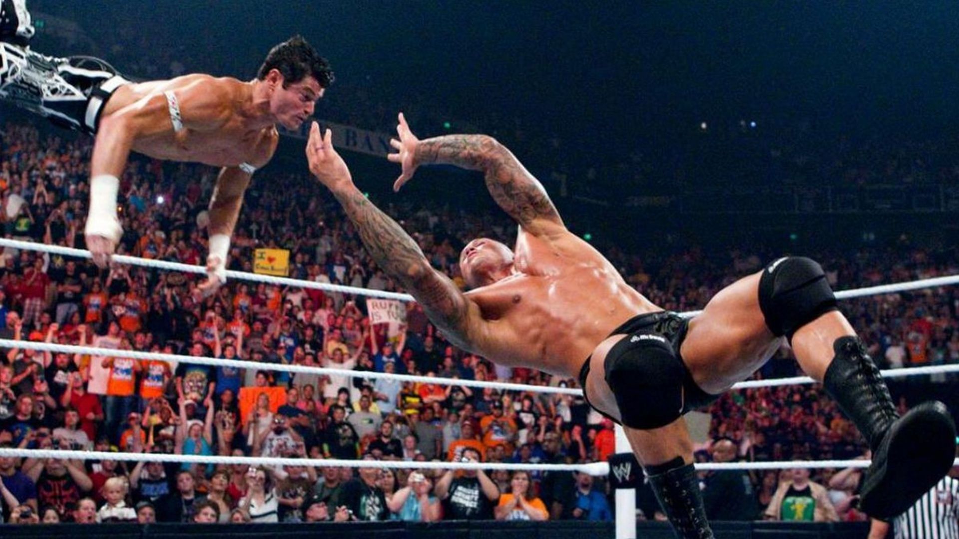 Randy Orton catches Evan Bourne in mid-air for an RKO.