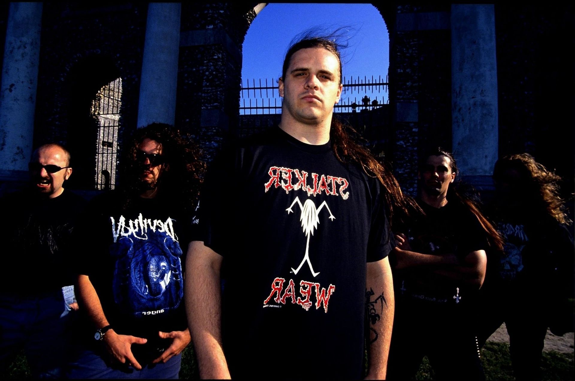 Cannibal Corpse pose for a group photo in a cemetary in 2000 (Image via Getty Images)