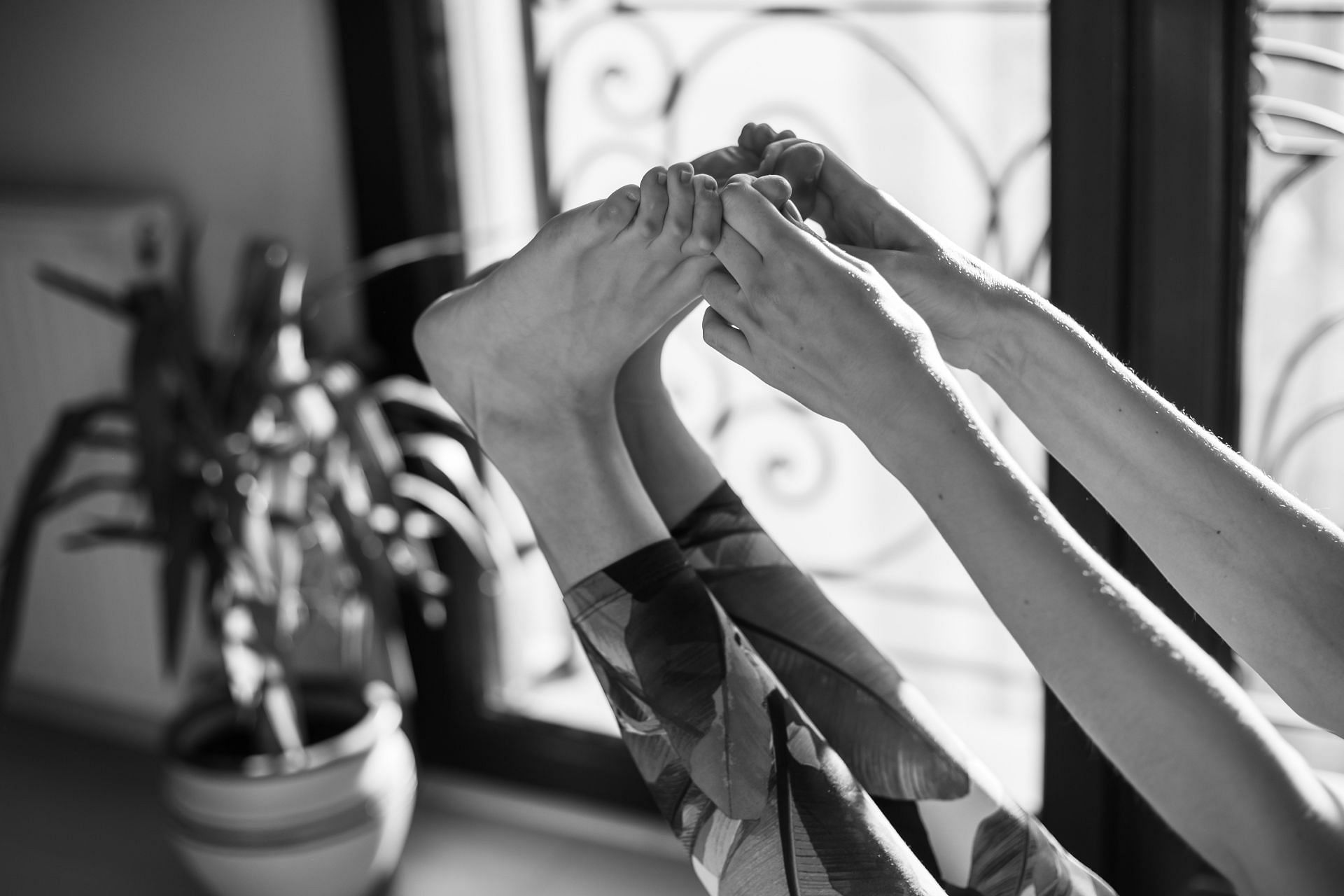 Yoga for feet helps to avoid injury. (Image via Pexels/ Roman Odinstov)