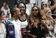 Venus Williams (C) and Serena Williams (R)