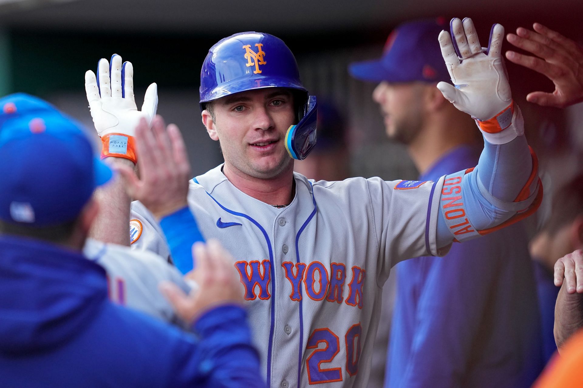 Pete Alonso of the New York Mets celebrates with teammates after a homer against the Cincinnati Reds.