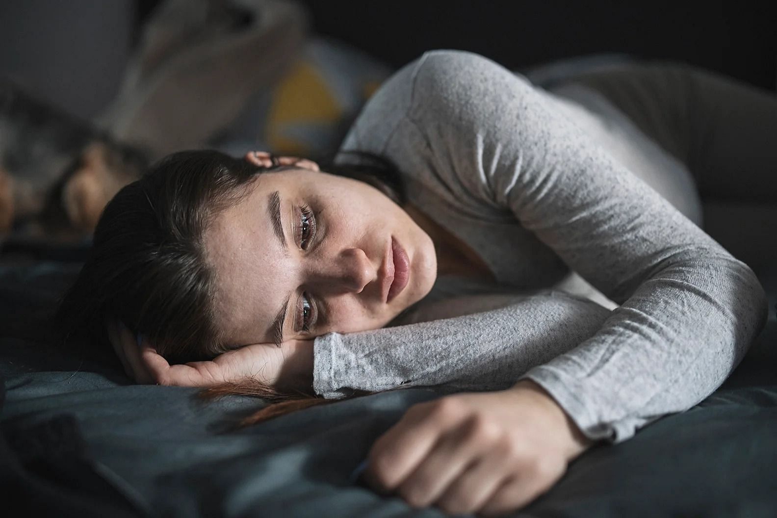 A person not being able to sleep. (Image Via Getty)