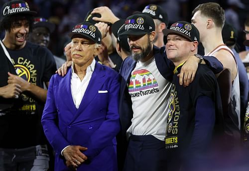 Denver Nuggets owner Stan Kroenke, team president Josh Kroenke, and coach Michael Malone