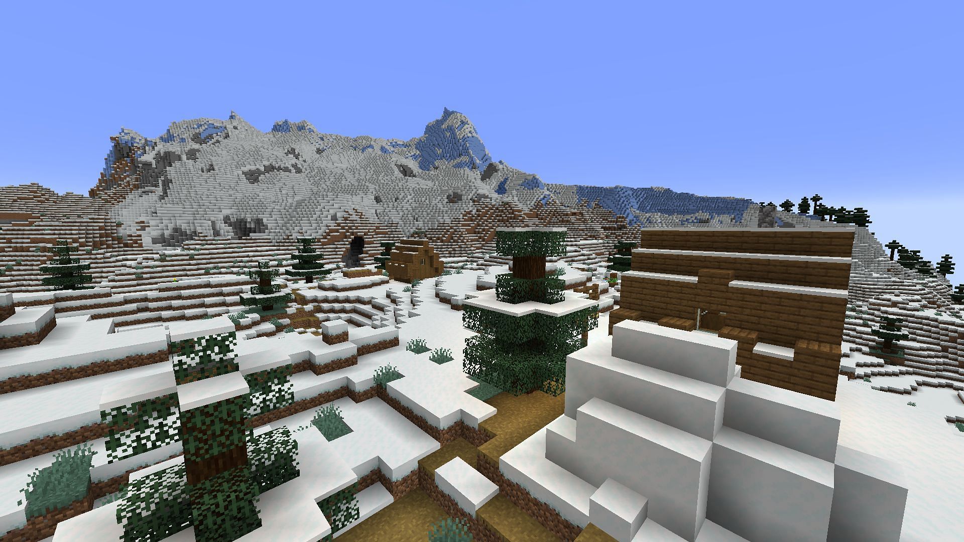 Холодные горы рядом с деревней этого семени Minecraft хранят темную тайну (Изображение взято с Mojang)