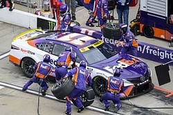Denny Hamlin front tire changer AJ Rosini broke his canine tooth in the accident at the WWT Raceway