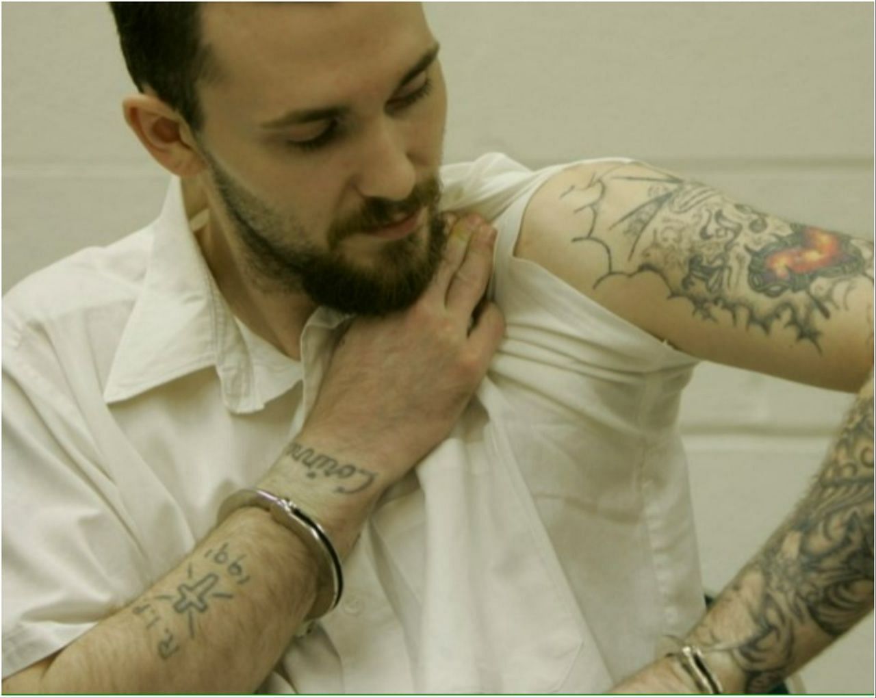 Tisius showing his tattoos during an interview at Potosi Correctional Center, Missouri&#039;s maximum security prison (Image via AP Photo/Jeff Roberson)