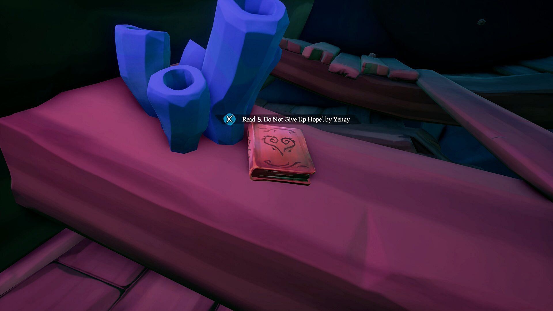 This debris is to the right of a statue (Image via Sea of Thieves)