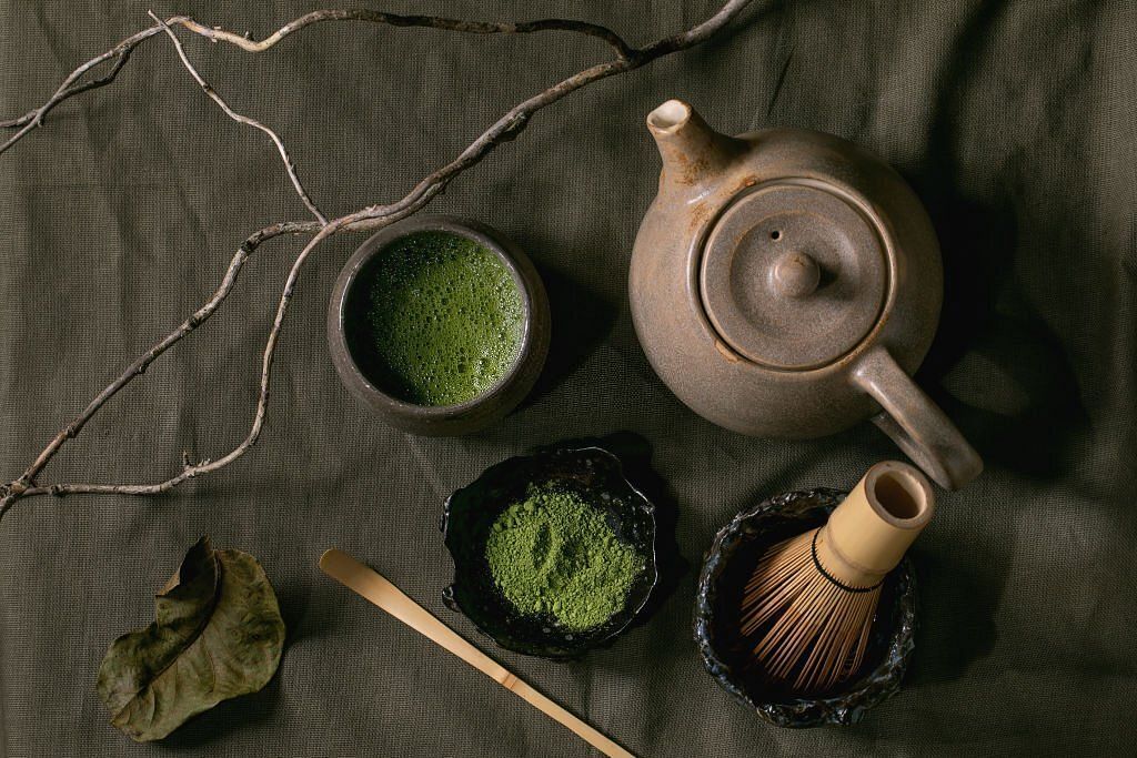 Traditional japanese hot green frothy tea matcha in ceramic cup(Image via Getty Images)